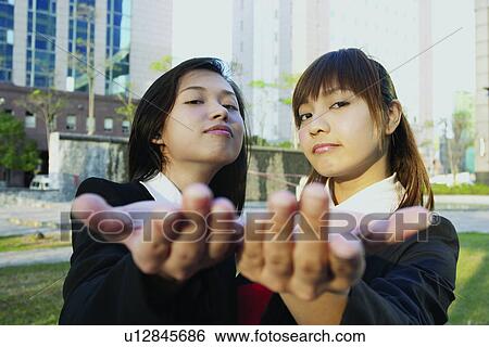 Stock Photograph - Head And Shoulders, Office, Day, Brown Hair, Communication. Fotosearch
