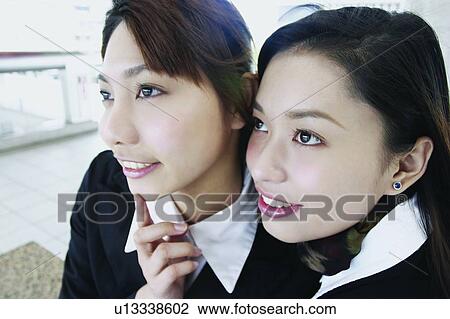 Stock Image - Human Face, Lady, Looking Away, Earring, Asian Ethnicity, Adults Only. Fotosearch