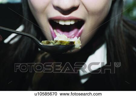 Stock Image - Leisure Activity, Eating, Day, Holding, Healthy Eating. Fotosearch