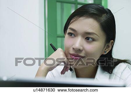 Stock Image - Pen, Office, Lady, Close-Up, One Person. Fotosearch