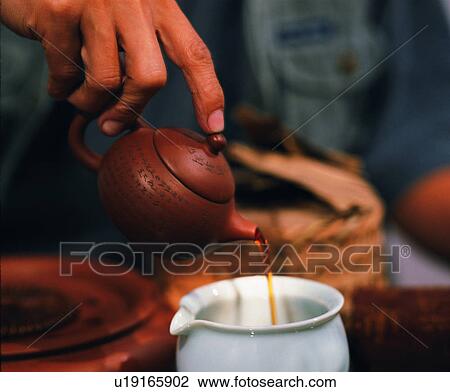Stock Image - old, oriental, traditional, teapot, tea, cup. Fotosearch