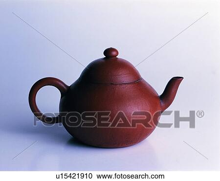 Stock Image - old, traditional, teapot, oriental, brown. Fotosearch