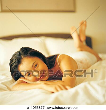 Black Hair, Barefoot, Asian, Bedroom, Bed, Asian Ethnicity View Large Photo Image Stock Photo - Black Hair, Barefoot, Asian, Bedroom, Bed, Asian Ethnicity. Fotosearch