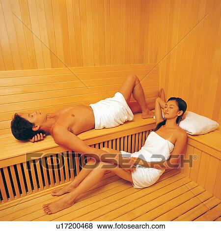 Stock Photo - Lifestyles, Leaning, Sitting, Wood Paneling, Semi-Dress, Barefoot. Fotosearch