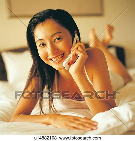 Stock Photo - Medium-Length Hair, Close-Up, Bedroom, Indoor. Fotosearch