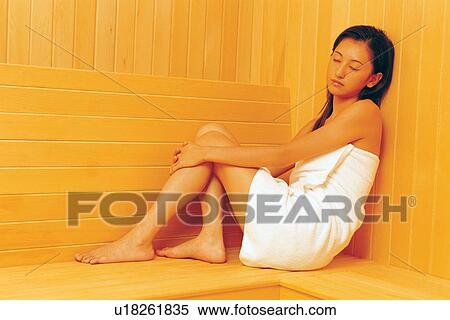 Wood Paneling, Young Adult, Indoor, Semi-Dress, Wrapped In A Towel, Leisure Activity, Sitting View Large Photo Image Stock Photography - Wood Paneling, Young Adult, Indoor, Semi-Dress, Wrapped In A Towel, Leisure Activity, Sitting. Fotosearch