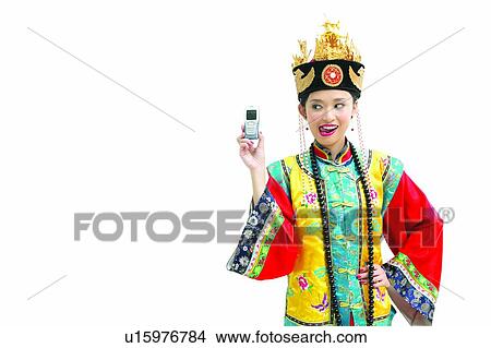 Picture - Beauty, China, Indoor, Toothy Smile, Necklace, Hand On Hip. Fotosearch