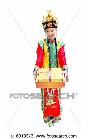 Stock Image - China, White Background, Earring, Toothy Smile. Fotosearch