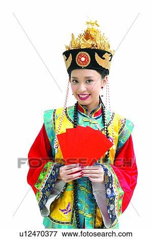 Stock Photo - One Young Woman Only, White Background, Young Adult, Traditional Clothing, Confidence, Indoor. Fotosearch