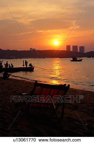 Beach, Beach Chair, Boat, Dusk, Glow View Large Photo Image Stock Image - Beach, Beach Chair, Boat, Dusk, Glow. Fotosearch