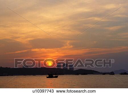 Stock Image - Boat, Cloud, Coastal, Dusk, Glow. Fotosearch