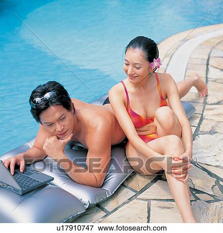 Asian, Bikini, At The Edge Of, Romance, Asian Ethnicity View Large Photo Image Stock Photo - Asian, Bikini, At The Edge Of, Romance, Asian Ethnicity. Fotosearch