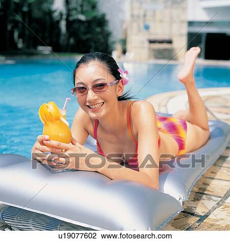 Asian, Bikini, Barefoot, Enjoyment, Asian Ethnicity View Large Photo Image Stock Image - Asian, Bikini, Barefoot, Enjoyment, Asian Ethnicity. Fotosearch