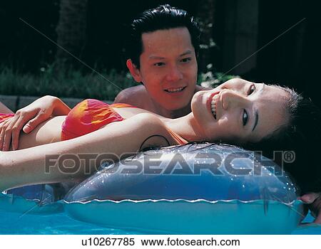 Asian, Black Hair, Bikini, Romance, Asian Ethnicity View Large Photo Image Stock Photography - Asian, Black Hair, Bikini, Romance, Asian Ethnicity. Fotosearch