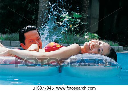 Asian, Black Hair, Bikini, Romance, Asian Ethnicity View Large Photo Image Stock Photography - Asian, Black Hair, Bikini, Romance, Asian Ethnicity. Fotosearch