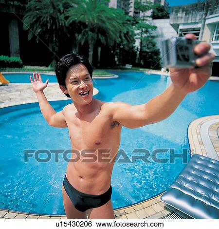 Asian, Blue, Black Hair, Take Asian Ethnicity, Arm Raised View Large Photo Image Stock Photograph - Asian, Blue, Black Hair, Take Asian Ethnicity, Arm Raised. Fotosearch