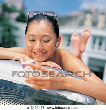 Stock Image - Asian, Close-Up, Black Hair, Barefoot, Asian Ethnicity. Fotosearch