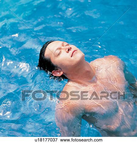 Stock Photo - Asian, Close-Up, Clear, Blue, Asian Ethnicity. Fotosearch