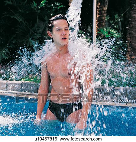 Stock Photograph - Asian, Close-Up, Splashing, Asian Ethnicity. Fotosearch