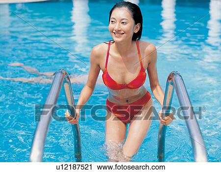 Stock Image - Asian Ethnicity, Black Hair, Bikini, Asian, Ascending. Fotosearch