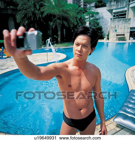 Black Hair, Holding, Standing, Swimming Pool, Tourist Resort, Blue, Square View Large Photo Image Stock Image - Black Hair, Holding, Standing, Swimming Pool, Tourist Resort, Blue, Square. Fotosearch