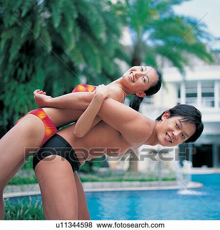 Close-Up, Young Women, Vacations, Palm, Two People, Focus On Foreground View Large Photo Image Stock Photo - Close-Up, Young Women, Vacations, Palm, Two People, Focus On Foreground. Fotosearch