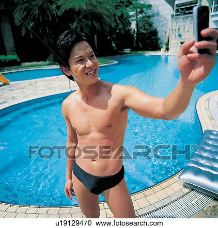 Stock Image - Hand Raised, Technology, Lifestyles, Fun, Outdoor, Toothy Smile. Fotosearch