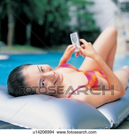 Picture - Youth Culture, Day, Portrait, Water, Smiling, Asian Ethnicity. Fotosearch