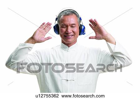Stock Image - Asian Ethnicity, Close-Up, Casual Clothing, Active. Fotosearch