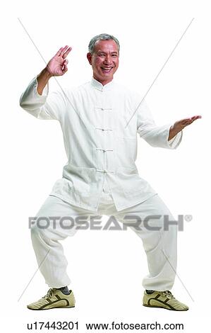 Stock Image - Asian Ethnicity, Close-Up, Casual Clothing, Bending, Active. Fotosearch