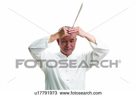 Stock Image - Asian Ethnicity, Close-Up, Casual Clothing, Active. Fotosearch
