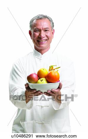 Close-Up, Apple, Citrus Fruit, Casual Clothing, Asian Ethnicity, Active View Large Photo Image Stock Image - Close-Up, Apple, Citrus Fruit, Casual Clothing, Asian Ethnicity, Active. Fotosearch