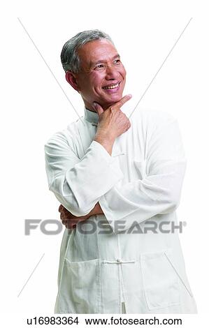 Picture - Contemplation, Confidence, Hand On Chin, Asian Ethnicity, Casual Clothing, Indoor. Fotosearch