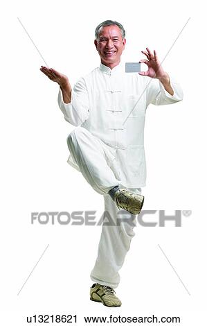 Stock Image - Credit Card, Korean Ethnicity, Tai-Chi Active, Smiling, Indoor. Fotosearch