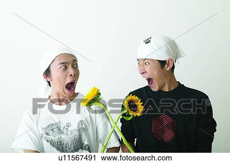 Stock Image - Adolescence, Close-Up, Casual Clothing, Asian Ethnicity, 16-17 Years. Fotosearch