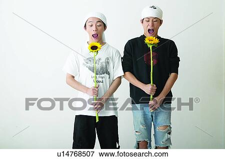 Stock Photo - Adolescence, Close-Up, Casual Clothing, Asian Ethnicity, 16-17 Years. Fotosearch