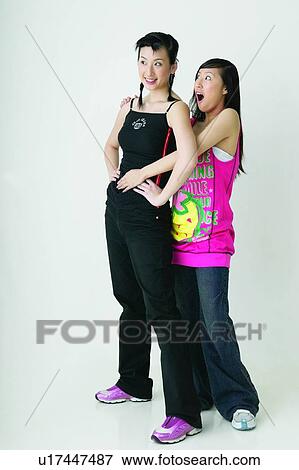Stock Photo - Braids, Adolescence, Black Hair, Asian Ethnicity, Arms Akimbo, Casual Clothing, 16-17 Years. Fotosearch