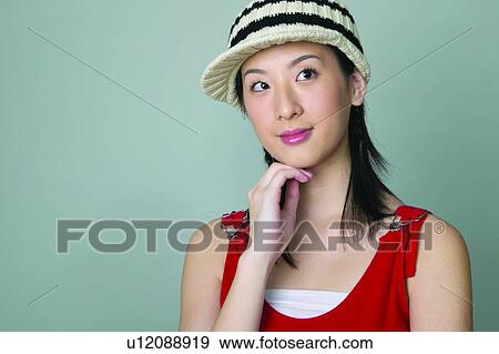 Stock Photo - Brown Hair, Teenager, Asian Ethnicity, Adolescence, Lifestyles. Fotosearch