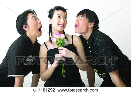 Stock Image - Bunch Of Flowers, Adolescence, Braids, Black Hair, Asian Ethnicity, Casual Clothing, 16-17 Years. Fotosearch