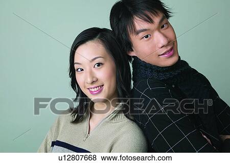 Casual Clothing, Adolescence, Black Hair, Back To Back, Asian Ethnicity, Checked, 16-17 Years View Large Photo Image Stock Photo - Casual Clothing, Adolescence, Black Hair, Back To Back, Asian Ethnicity, Checked, 16-17 Years. Fotosearch
