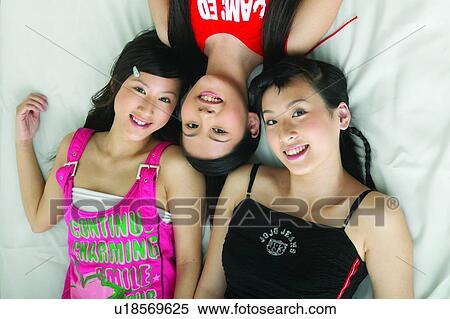 Casual Clothing, Adolescence, Black Hair, Bed, Asian Ethnicity, Close-Up, 16-17 Years View Large Photo Image Stock Photography - Casual Clothing, Adolescence, Black Hair, Bed, Asian Ethnicity, Close-Up, 16-17 Years. Fotosearch