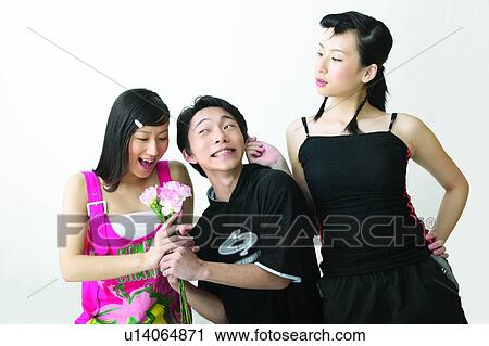 Casual Clothing, Adolescence, Bunch Of Flowers, Black Hair, Asian Ethnicity, Close-Up, 16-17 Years View Large Photo Image Stock Image - Casual Clothing, Adolescence, Bunch Of Flowers, Black Hair, Asian Ethnicity, Close-Up, 16-17 Years. Fotosearch