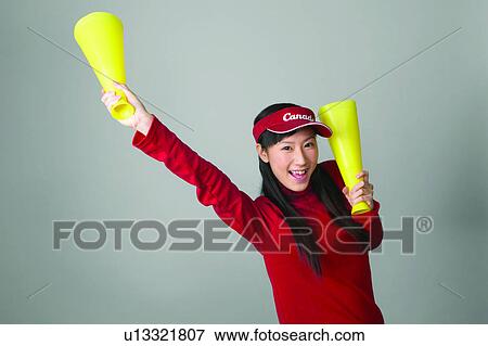 Stock Photo - Casual Clothing, Adolescence, Cap, Black Hair, Asian Ethnicity, Close-Up, 16-17 Years. Fotosearch