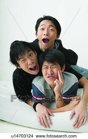 Picture - Casual Clothing, Teenagers Only, Looking At Camera, Eastern, Mouth Open. Fotosearch