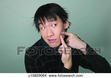 Picture - Checked, Adolescence, Casual Clothing, Black Hair, Asian Ethnicity, Close-Up, 16-17 Years. Fotosearch