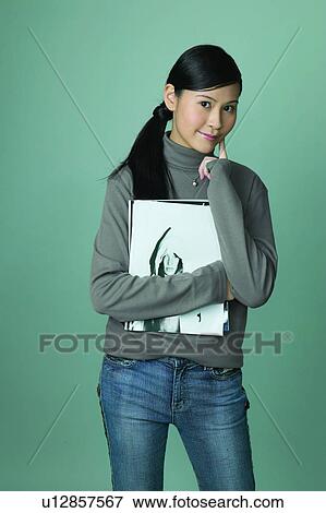 Close-Up, Adolescence, Casual Clothing, Black Hair, Asian Ethnicity, 16-17 Years View Large Photo Image Stock Photo - Close-Up, Adolescence, Casual Clothing, Black Hair, Asian Ethnicity, 16-17 Years. Fotosearch
