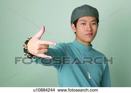 Close-Up, Real People, Thumbs Up, Head And Shoulders, One Person View Large Photo Image Picture - Close-Up, Real People, Thumbs Up, Head And Shoulders, One Person. Fotosearch