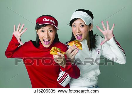 Eastern, High-Five, Asian Ethnicity, Slice, Food And Drink, Black Hair, Smiling View Large Photo Image Stock Photography - Eastern, High-Five, Asian Ethnicity, Slice, Food And Drink, Black Hair, Smiling. Fotosearch