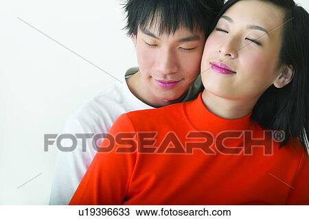 Stock Image - Eyes Closed, Teenage Boys, Teenagers, Romance, Love, Smiling. Fotosearch