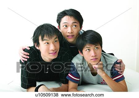 Happiness, Wristband, Close-Up, Adolescence, Head And Shoulders View Large Photo Image Stock Photo - Happiness, Wristband, Close-Up, Adolescence, Head And Shoulders. Fotosearch
